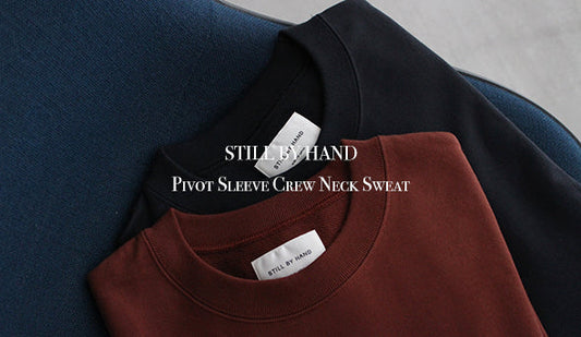 【STILL BY HAND / スティル バイ ハンド】Pivot Sleeve Crew Neck Sweatをオンラインショップに掲載いたしました。